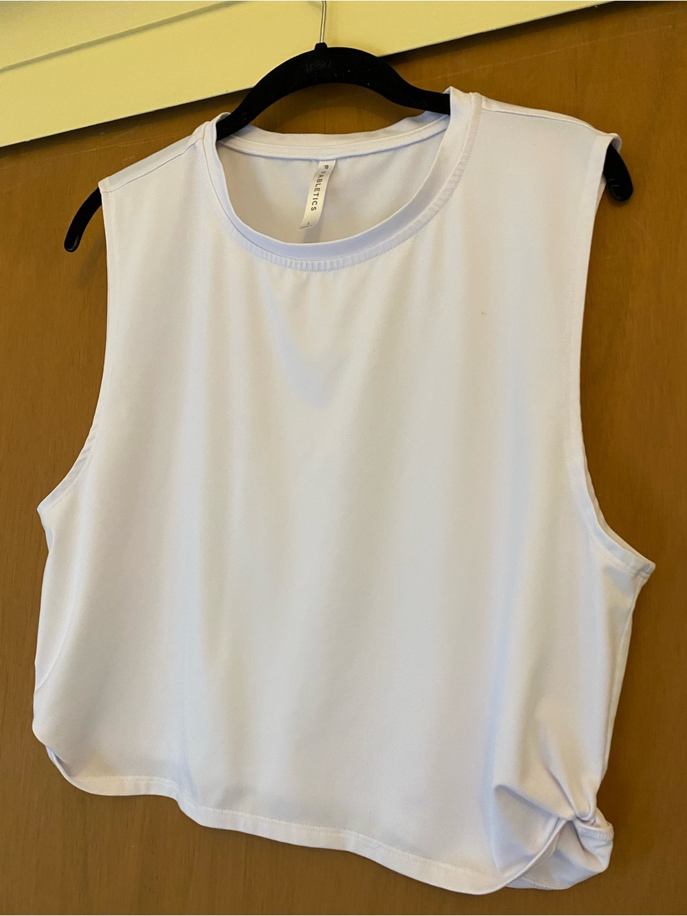Fabletics White Sleeveless Muscle Tee with Side Knot Detail